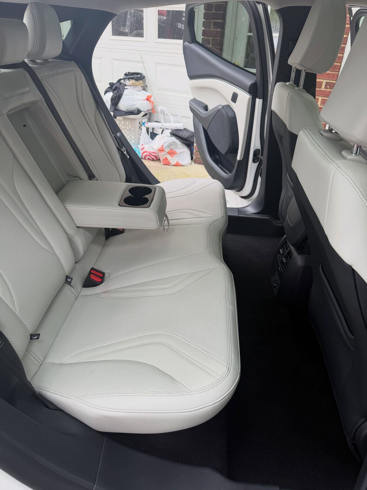 Pristine white leather seat steam cleaning